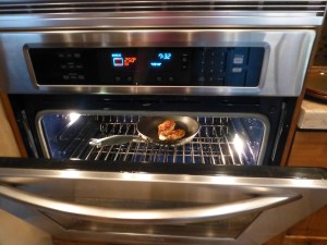 Chicken coming out of the oven