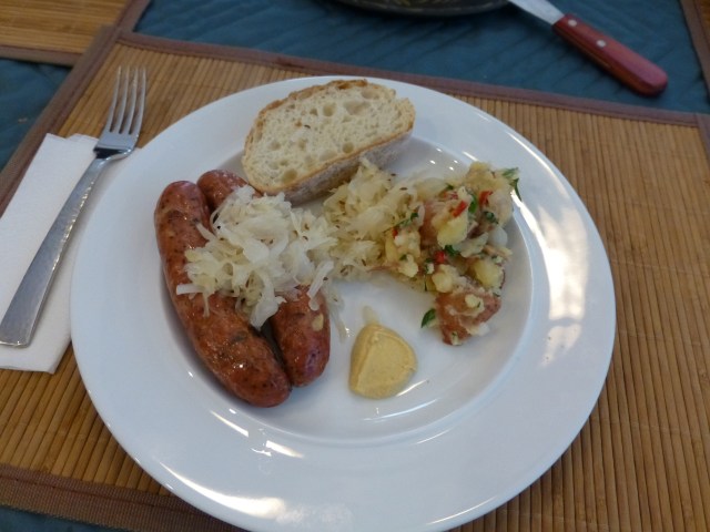 Chicken sausages, sauerkraut, and German potato salae
