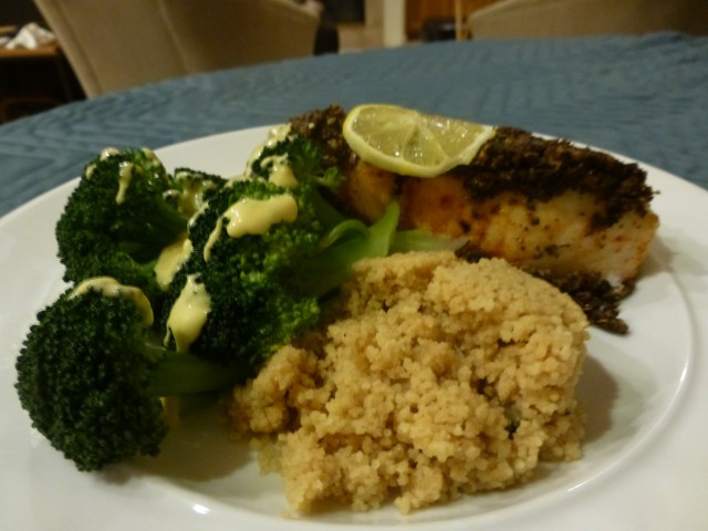 Chilean sea bass with mushroom topping, couscous, and broccoli with mustard sauce