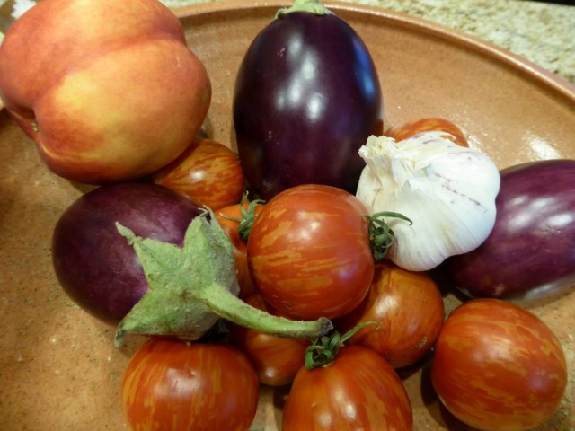 Our produce from the farmer's market - Indian eggplant, tiger tomatoes, garlic, and a nectarine