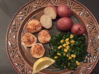 Scallops, new potatoes, collard greens and corn