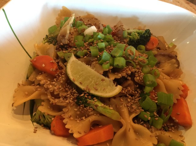 Farfalle and vegetables in peanut sauce