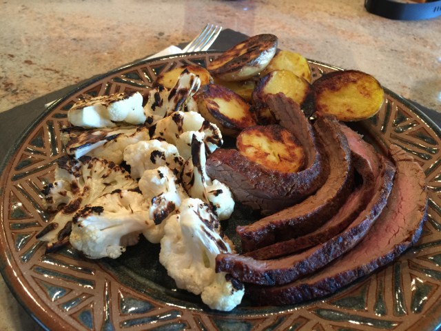 Grilled flank steak, new potatoes, and cauliflower