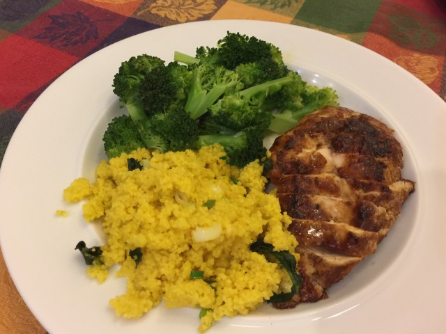 BBQ glazed chicken breast, lemon-garlic couscous, and screamed broccoli