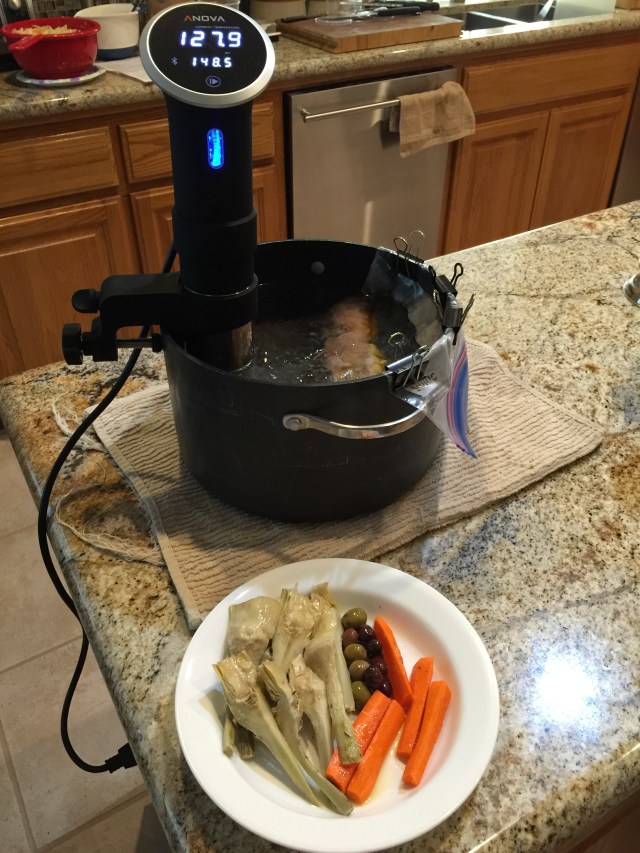 While the chicken was cooking we had a little appetizer of carrots, artichokes, and olives