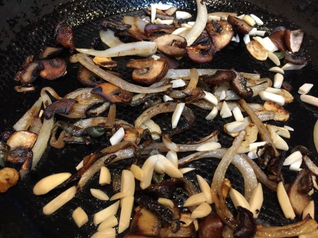Additional onions, mushrooms, and almonds