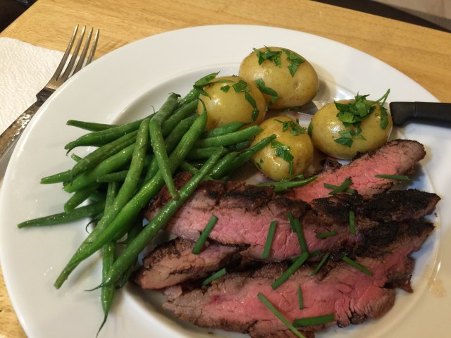 Grilled flank steak with new potatoes and haricot vert