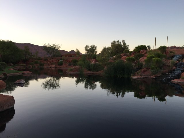 Dusk arrives at the pond behind our house