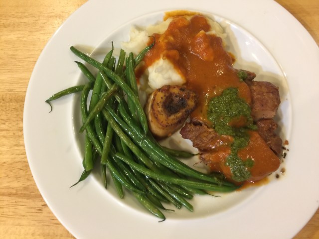 Veal shank, mashed potatoes, and green beans