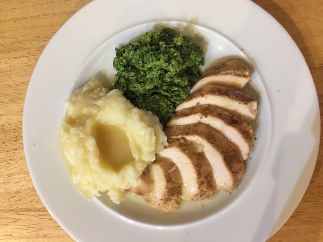 Sous vide chicken breast, mashed potatoes, and spinach