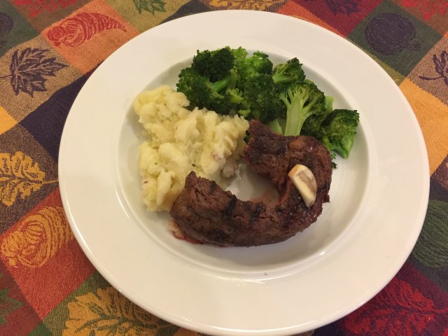 Ribeye cap with smashed red potatoes and broccoli