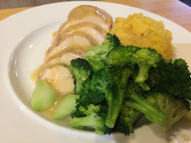 Chicken breast with gravy, mashed rutabagas, and broccoli